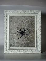 Sculpted insects cast in glass