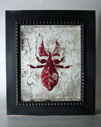 Sculpted insects cast in glass