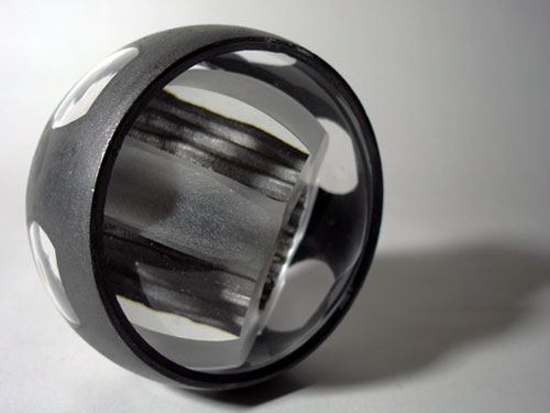 Carved glass forms with graphite finish